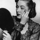 Illustration for article titled Dont Mind This Actress from the 1940s, Plucking Her Eyebrows